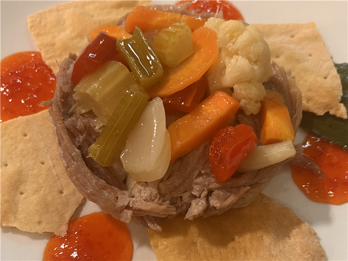 pulled pork with pickled vegetables and mustard